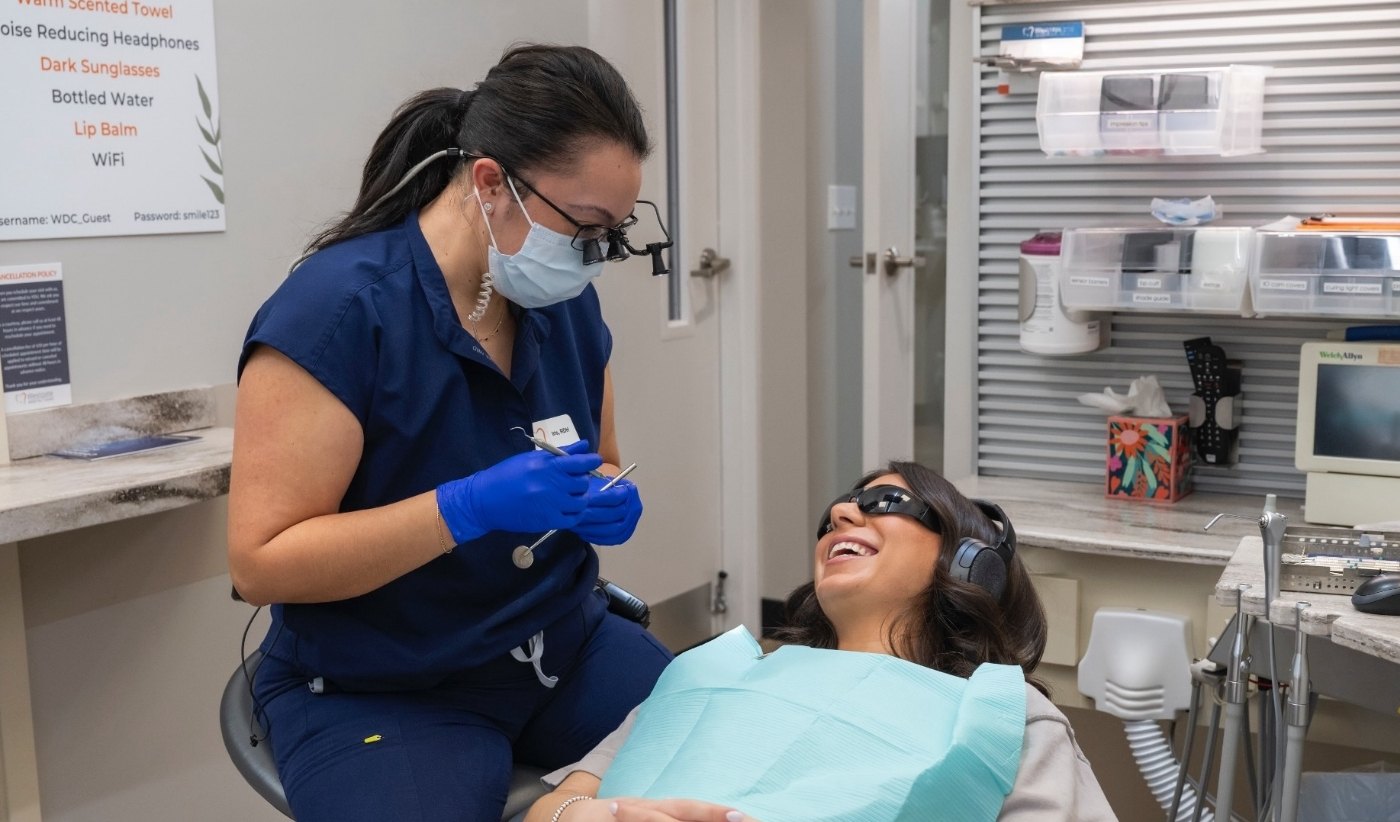 Dentist giving a patient a dental exam