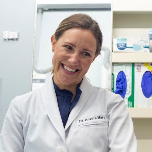 Dentist grinning at patient