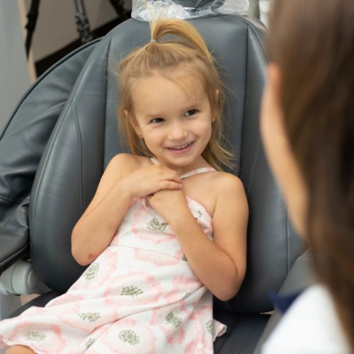 Little girl smiling at her dentist