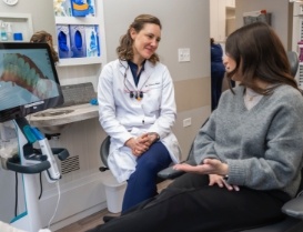 Dentist listening to a patient talk