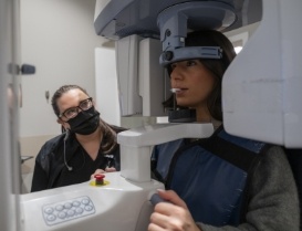 Dental patient having a 3 D cone beam scan taken of her head and jaw