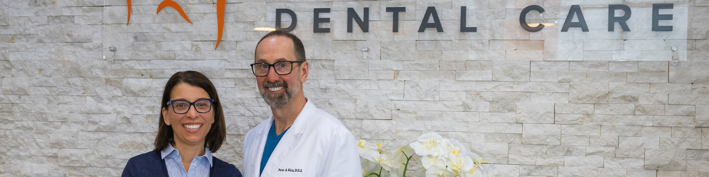 Two smiling dentists near Rolling Meadows
