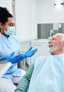 Man smiling at the dentist