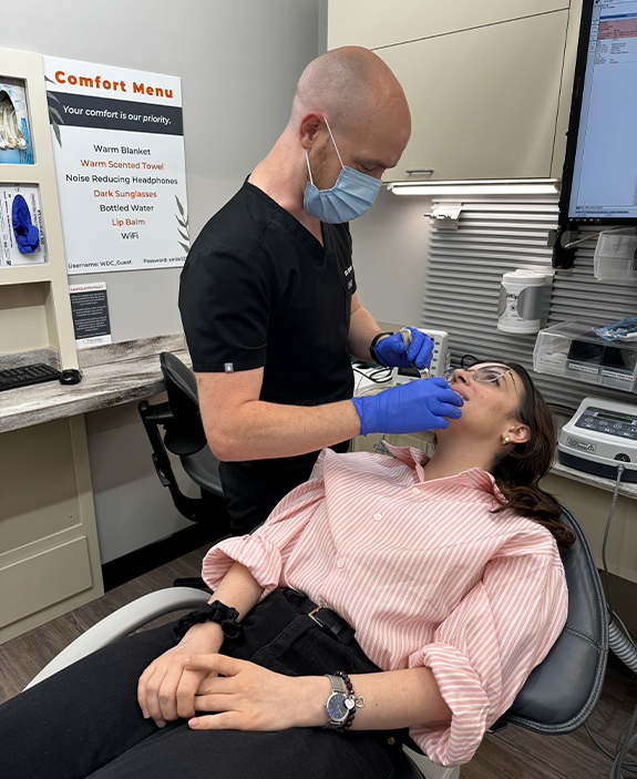 Doctor Brady treating a dental patient