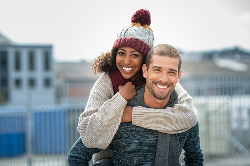 Patient smiling in the cold with good mouth health